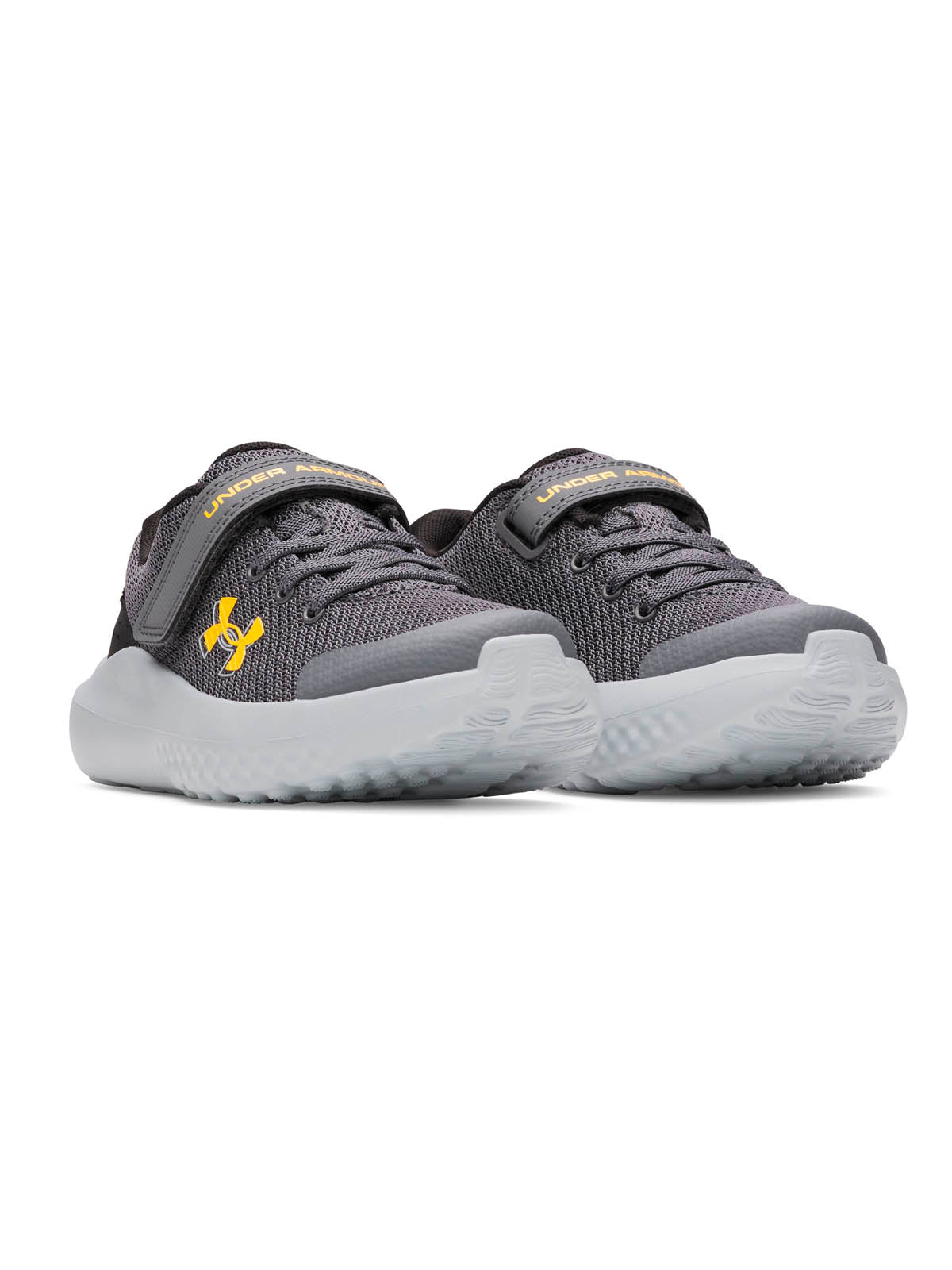 Zapatillas de running Under Armour Surge 4 AC gris para niños
