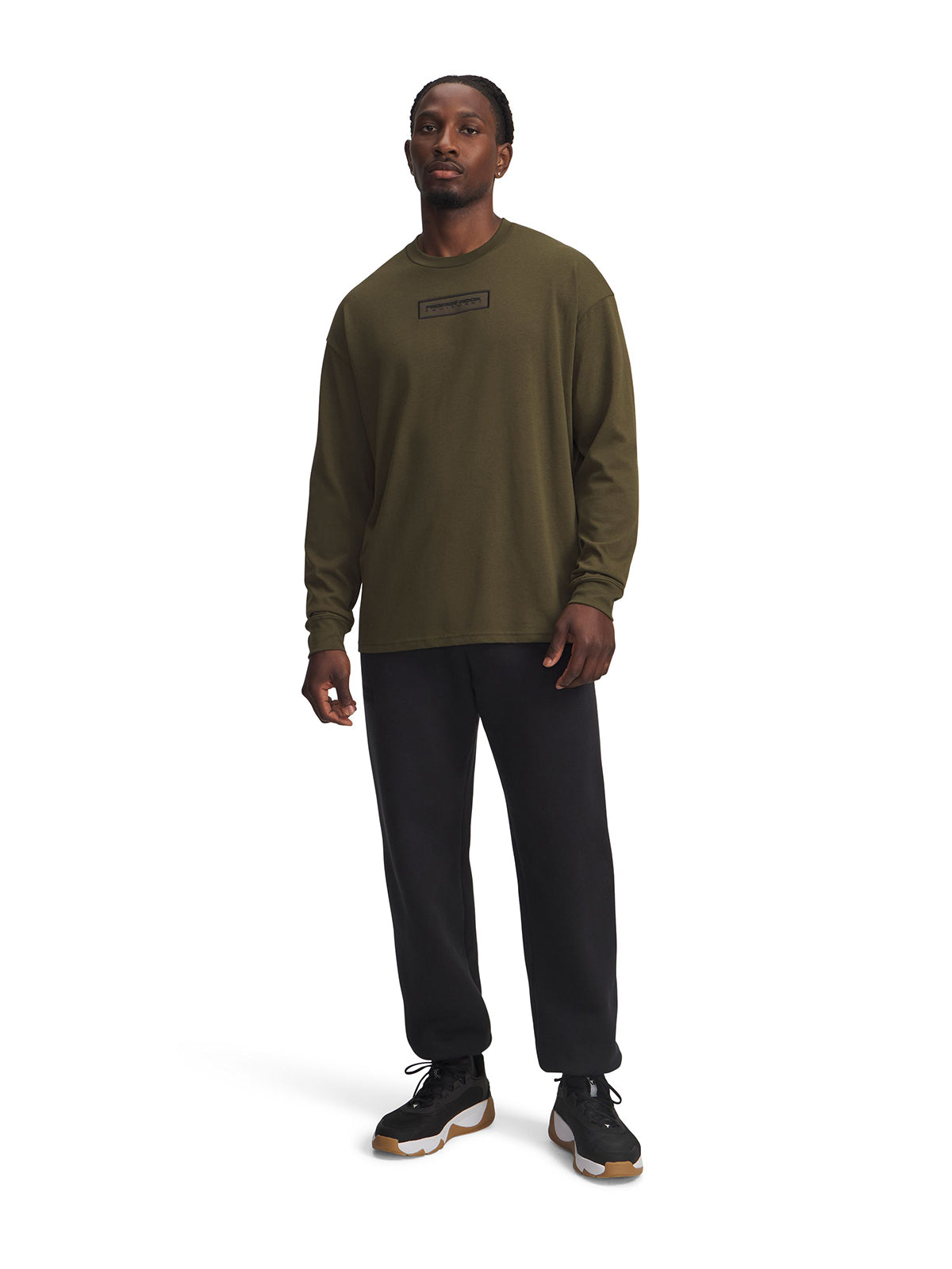 Polera manga larga de entrenamianto para hombre Project Rock verde Under Armour.