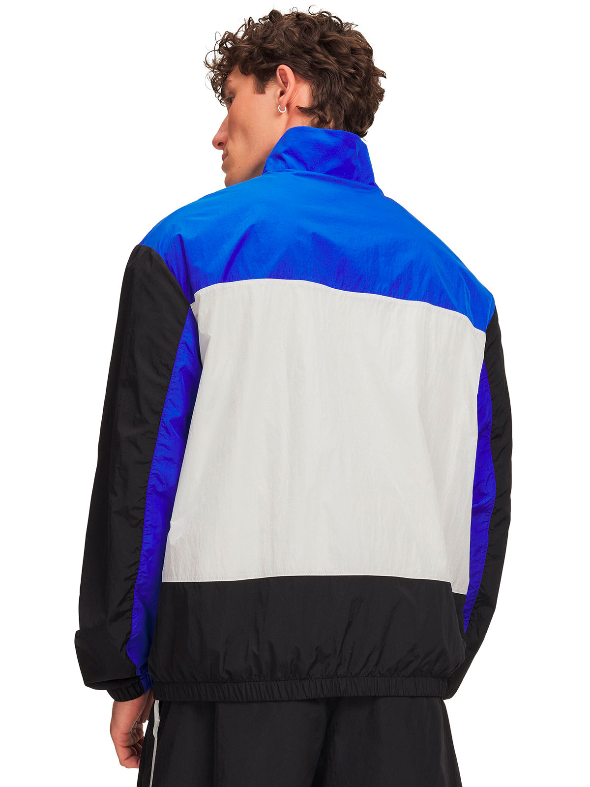 Poleron UA Icon Woven Track negro para hombre