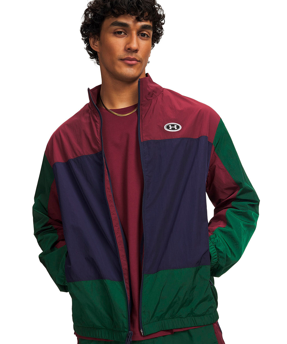 Poleron UA Icon Woven Track verde para hombre