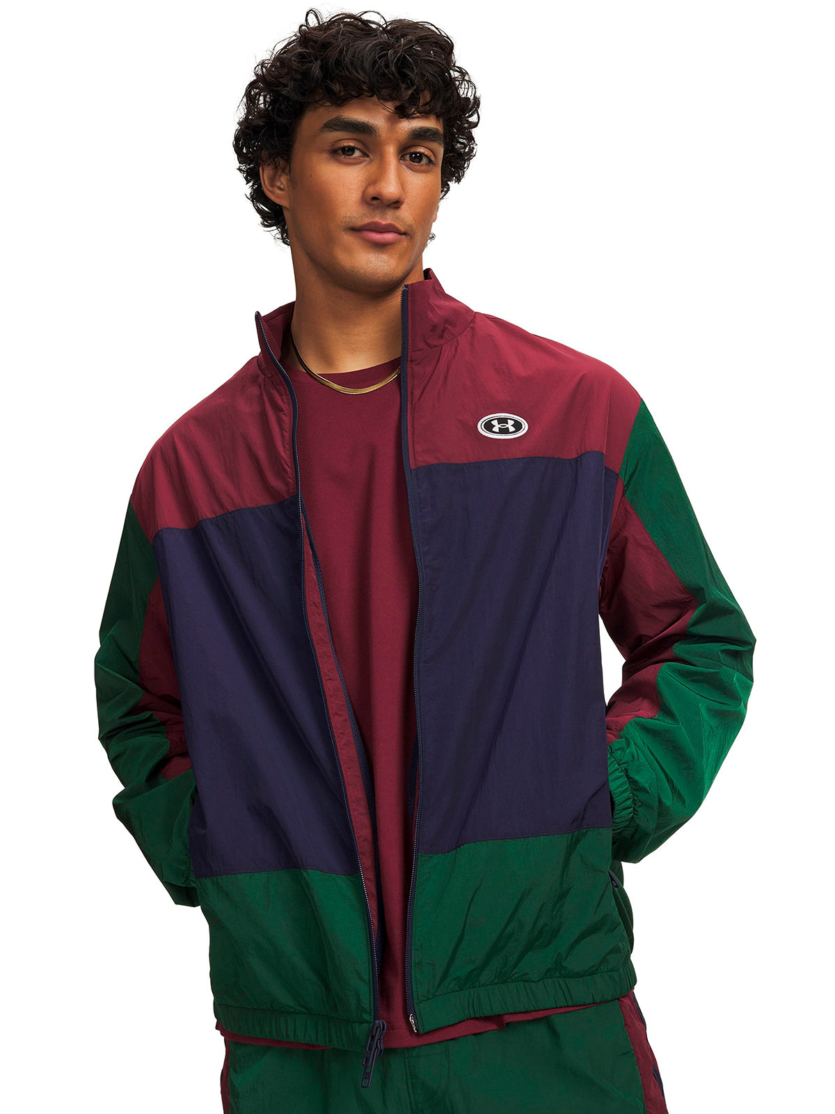 Poleron UA Icon Woven Track verde para hombre