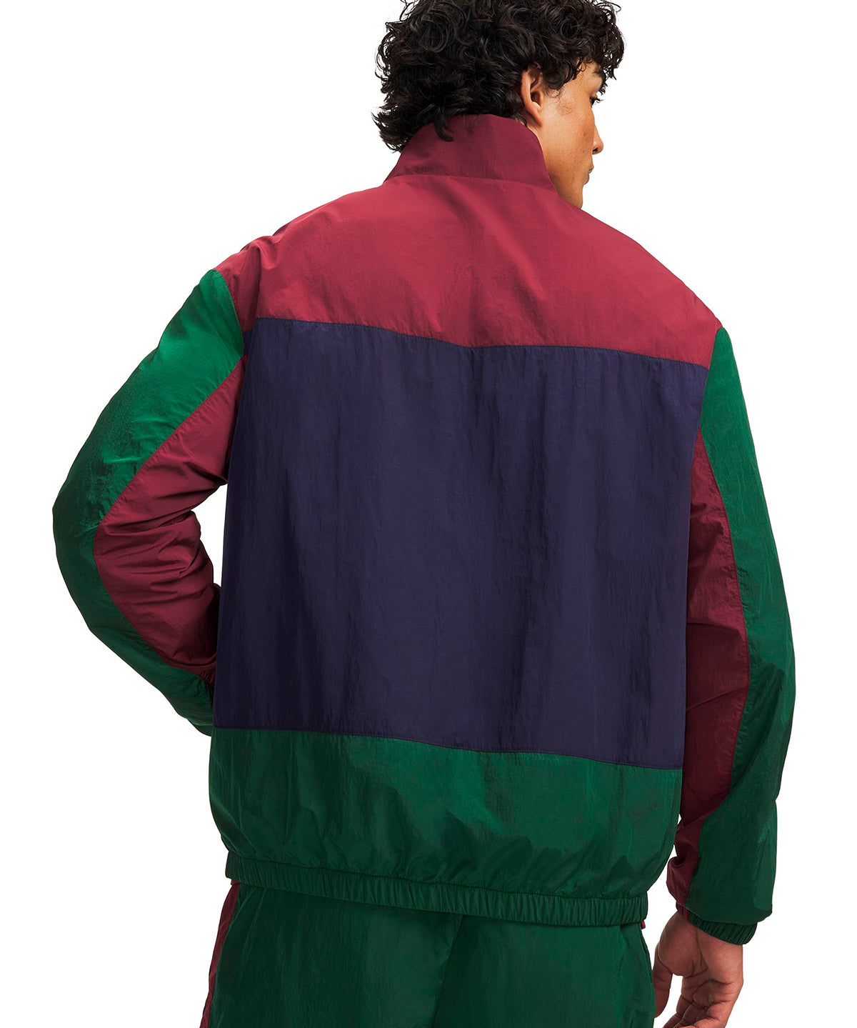 Poleron UA Icon Woven Track verde para hombre