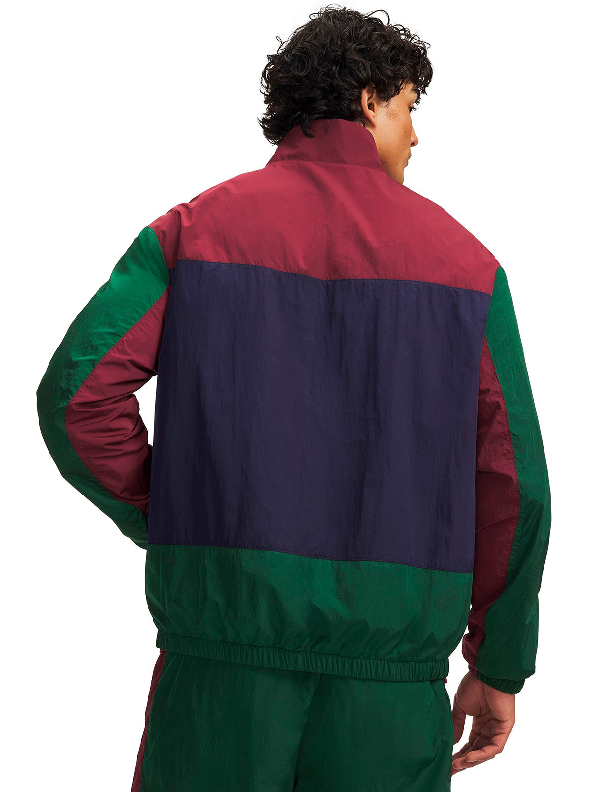 Poleron UA Icon Woven Track verde para hombre