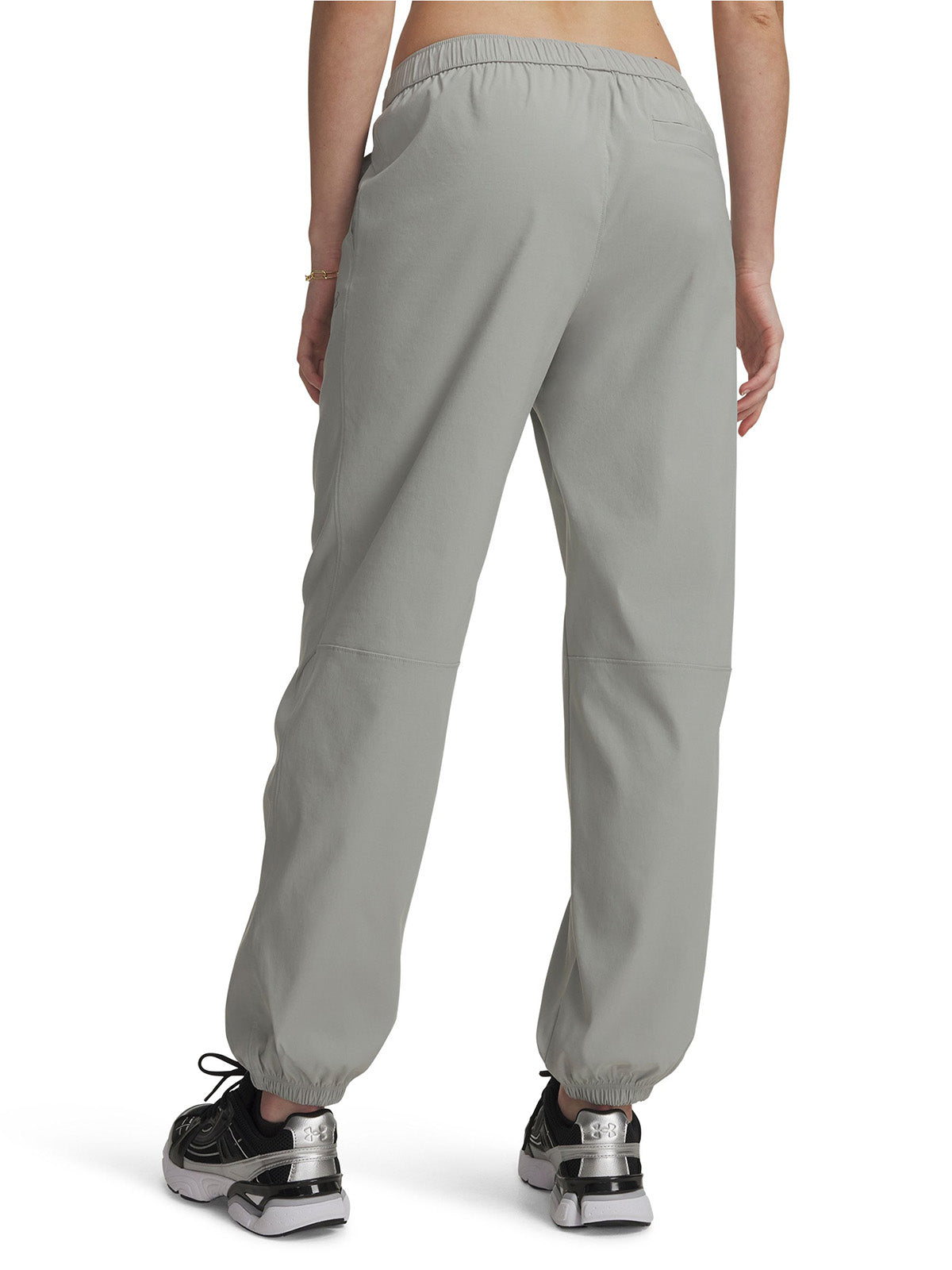 Jogger UA Unstoppable Woven gris para mujer