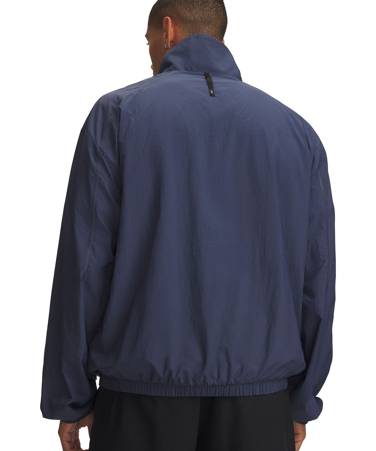 Poleron UA Unstoppable Woven ½ Zip gris para hombre