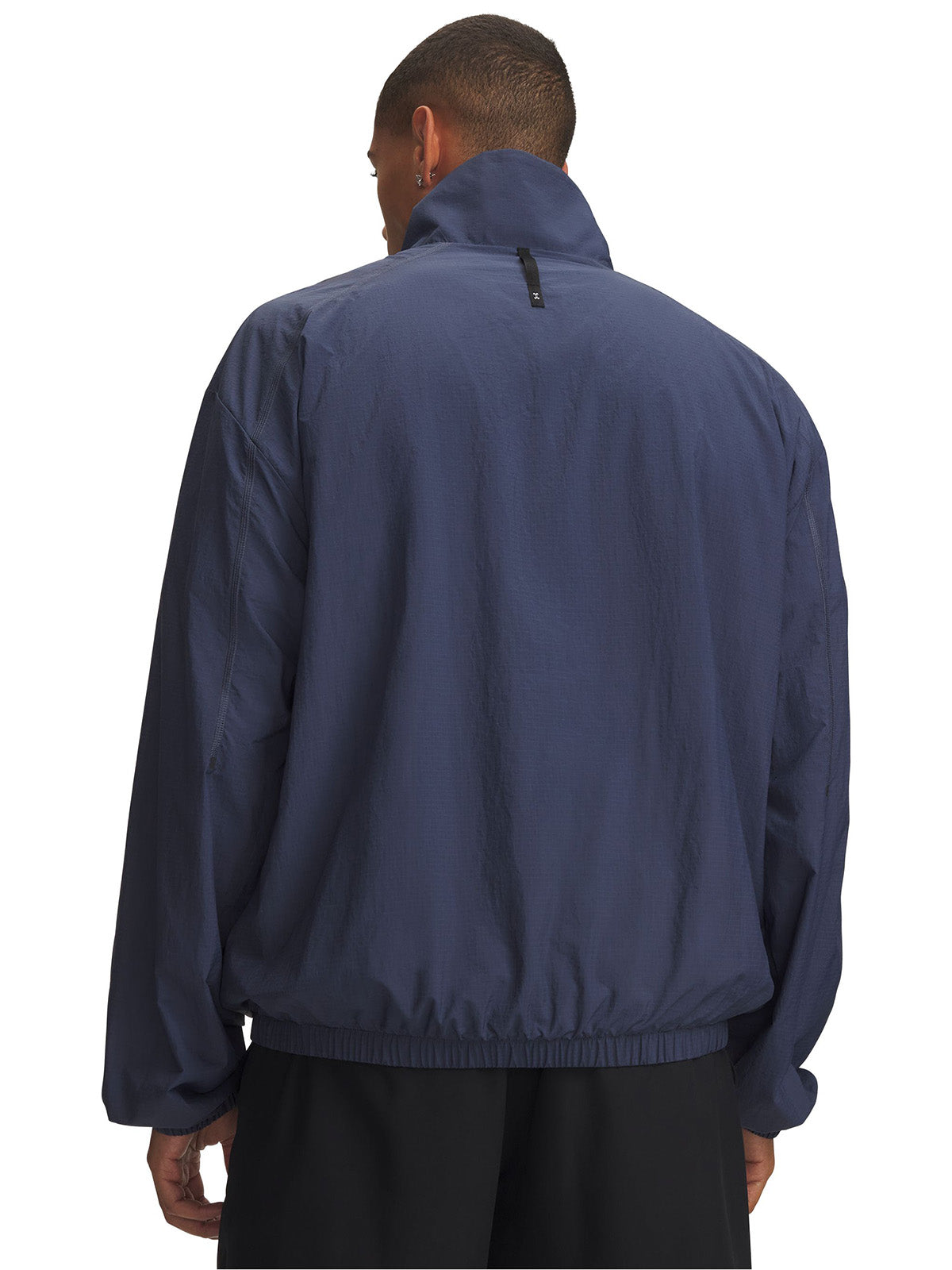 Poleron UA Unstoppable Woven ½ Zip gris para hombre
