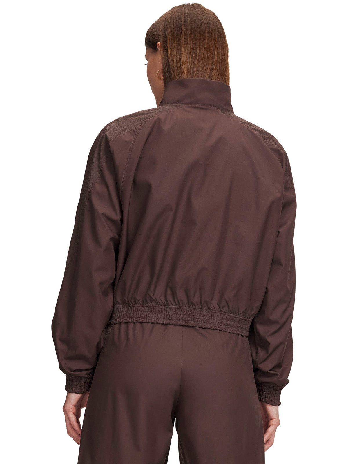 Chaqueta UA Icon Woven café para mujer
