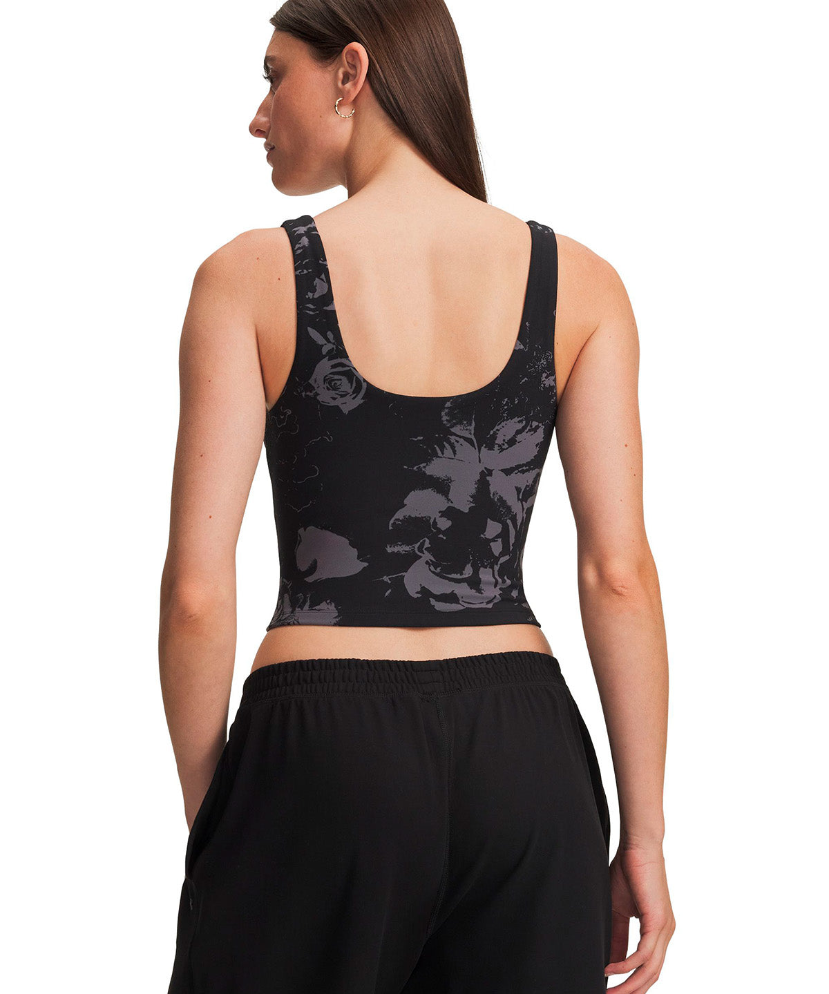 Polera UA Motion Print negra para mujer