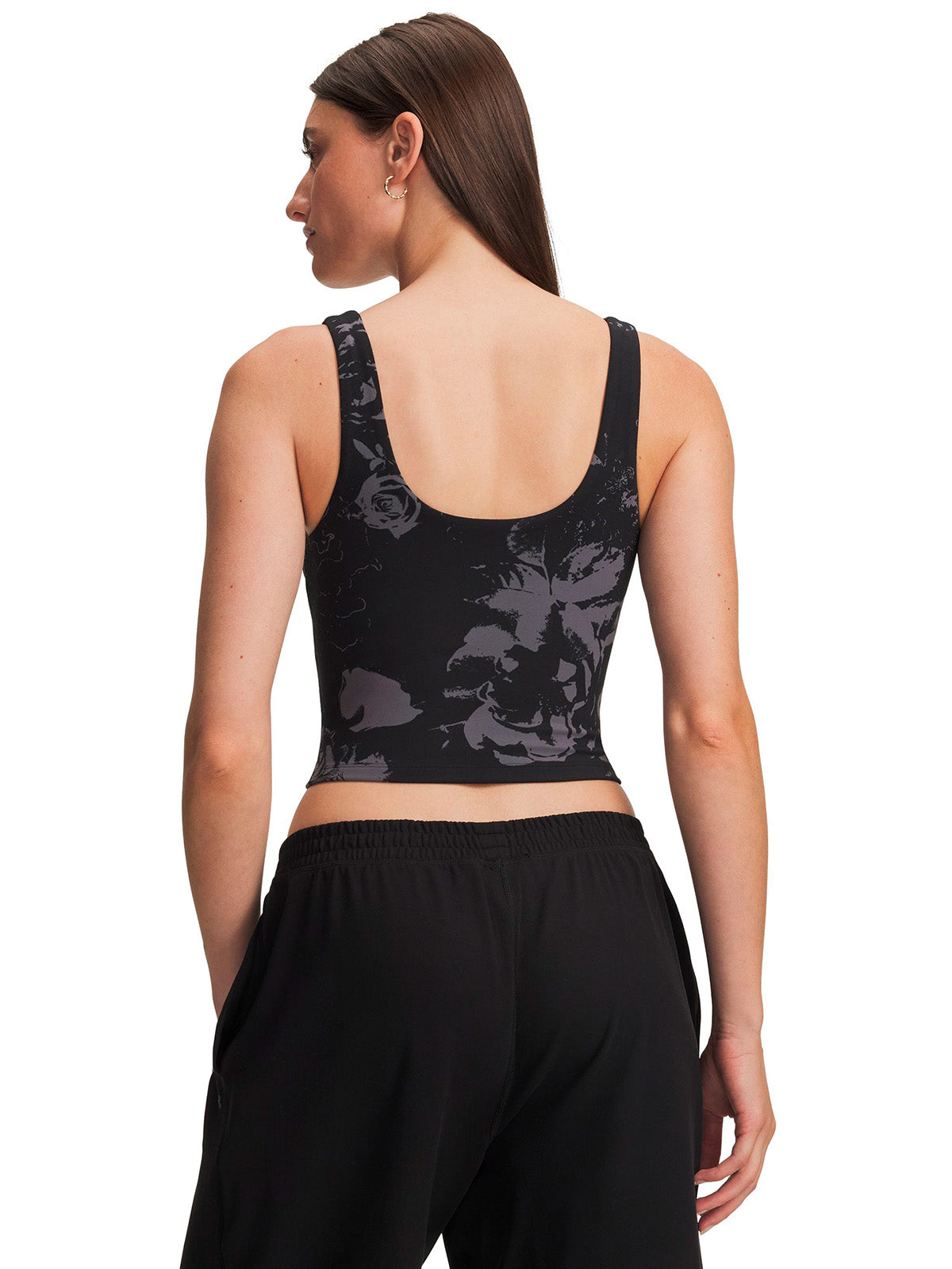 Polera UA Motion Print negra para mujer