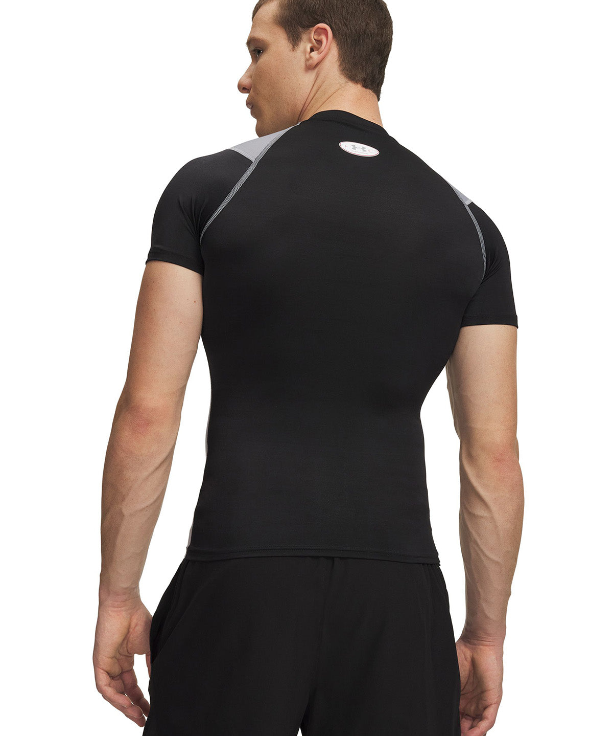UA HG Elite Comp SS Primera Capa Superior negro para hombre